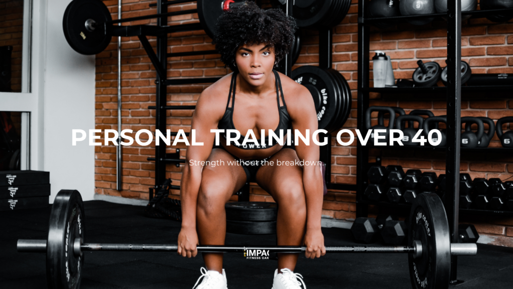Personal training over 40 in Oakland — adult athlete performing a barbell deadlift at Impact Fitness Oakland