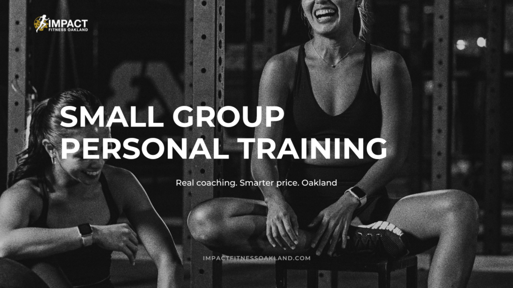 Small group personal training at Impact Fitness Oakland — multiple women training in a coached studio